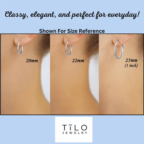 Vista 5 de Aretes redondos clásicos de oro blanco de 14K sin extremos