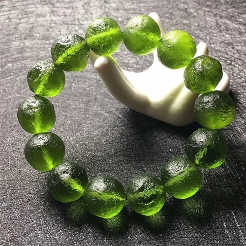 Vista 2 de Pulsera Moldavita de 0.315 in0.394 in0.472 in joyería de energía verde peridoto mujer hombre checa moldavita piedra estiramiento Buda pulsera