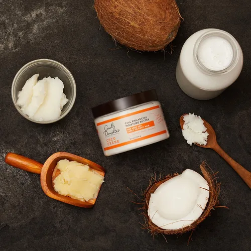 Vista 6 de Mantequilla humectante para cabello rizado muy seco Carol's Daughter Coco Creme, con aceite de coco y mantequilla de mango, sin parabenos y sin