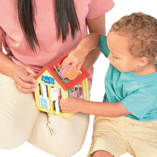 Vista 5 de TOMY Toomies Grow with Peppa Pig - Casa de actividades de Peppa - Centro de actividades para niños con clasificación de formas sensoriales