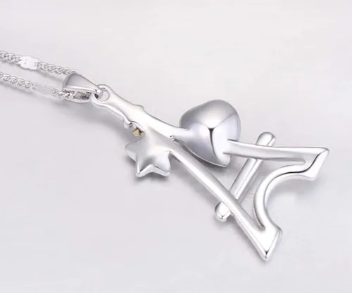 Vista 4 de NANA - Collar con colgante de torre Eiffel chapado en oro blanco con diseño de estrella de cristal Swarovski de corte de corazón