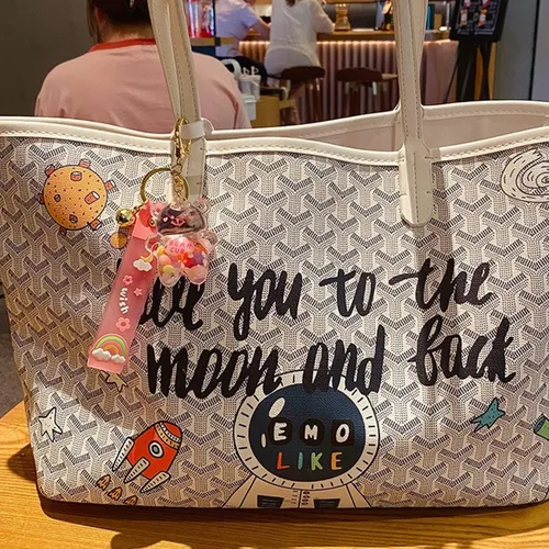 Vista 5 de Llavero Kawaii con diseño de oso líquido flotante de arena movediza, lindo llavero, bolsa, pulsera con dije para mujeres y niñas