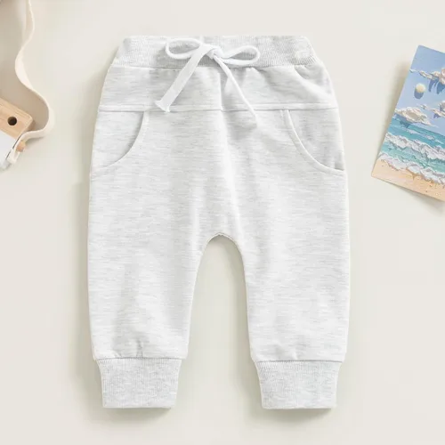Vista 3 de Mubineo Pantalones deportivos básicos lisos para bebés, niños y niñas, cómodos pantalones de algodón con bolsillos