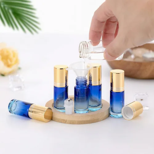 Vista 7 de Kesell 10 botellas enrollables de aceite esencial con tapa dorada, botellas enrollables de 0.17 onzas líquidas con bolas de acero inoxidable