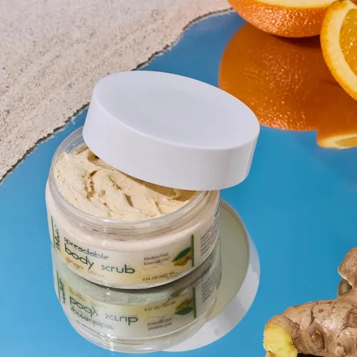 Vista 3 de Deluvia - Exfoliante corporal hidratante con aceites esenciales de jengibre y cítricos y minerales del mar muerto, paquete de 2