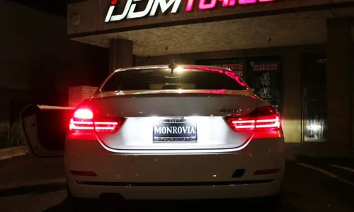 Vista 2 de iJDMTOY Brilliant Red 54-SMD 7506 7527 P21W Canbus - Bombillas de repuesto compatibles con BMW F22 F30 F32 2 3 4 Series luces direccionales traseras