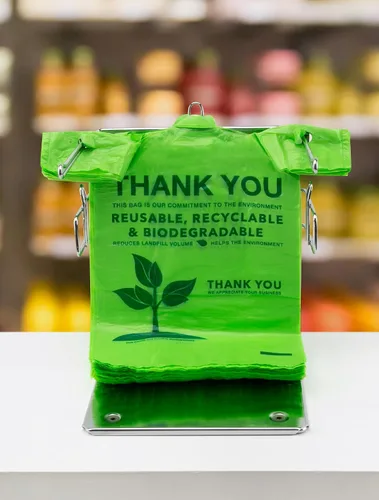 Vista 6 de UMT Plastar 500 bolsas biodegradables para camisetas, 11.5 x 6.25 x 21 pulgadas 16 bolsas de transporte ecológicas con asas fuertes para uso
