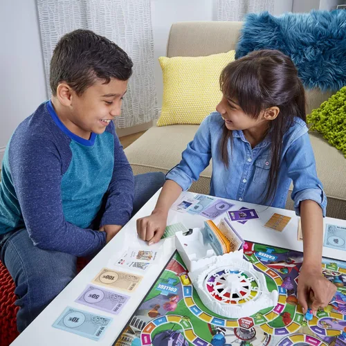 Vista 9 de Juego de mesa The Game of Life, juegos familiares para niños de 8 años en adelante, las clavijas vienen en 6 colores, juegos de mesa familiares