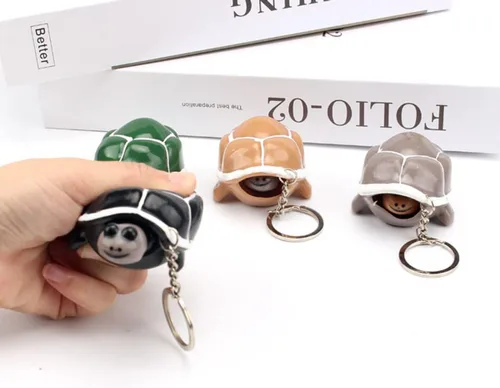 Vista 2 de 2 piezas de llavero de tortuga, juguete elástico de silicona para aliviar el estrés y la ansiedad, juguete para Halloween, abril, tontos, fiesta