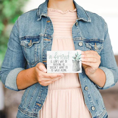 Vista 3 de Simply Said, INC Letrero Pequeño de Amistad con texto en inglés "A Friend Is God's Way of Proving He Doesn't Want Us to Walk Alone", placa de madera
