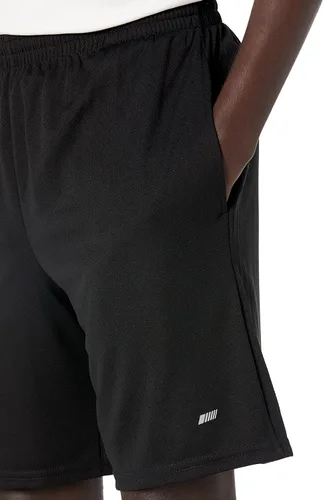 Vista 3 de Tienda Essentials - Pantalones cortos de corte suelto con tecnología de rendimiento para hombre
