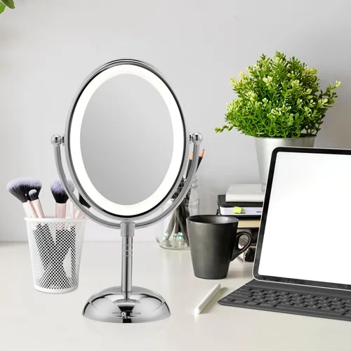 Vista 7 de Espejo ovalado de aumento con luz LED de doble cara para maquillaje; 1 x/7 X ampliación; acabado de cromo pulido, de Conair