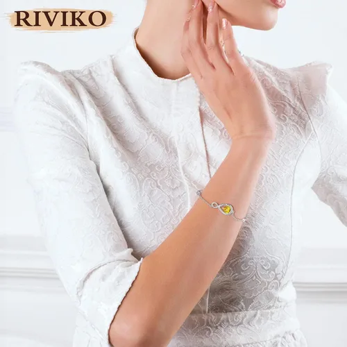 Vista 2 de RIVIKO Pulsera con símbolo de corazón infinito para mujer, pulseras grabadas de plata de ley 925 con circonita, eslabones ajustables, cumpleaños