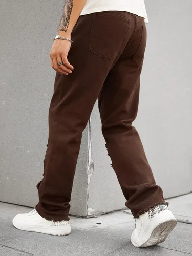 Vista 2 de WDIRARA Pantalones de mezclilla largos rasgados de cintura alta para hombre con bolsillo