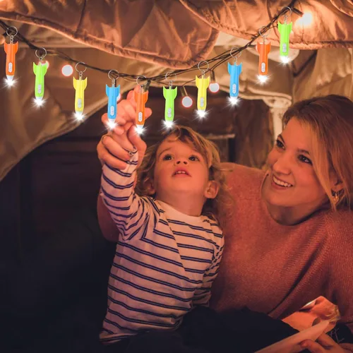 Vista 4 de 100 mini linternas de helicóptero, linterna LED de cohete, mini linternas a granel, linterna LED colorida, linternas pequeñas para niños, mini