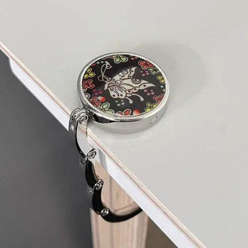 Vista 3 de Wrapables Percha escénica con gancho para bolso, colgador de mesa plegable para bolso, mariposa Deco