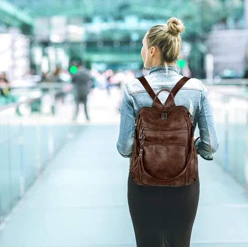 Vista 2 de UTO Mochila de cuero vegano para mujer, diseño de moda, convertible con borla, para viajes, con borla