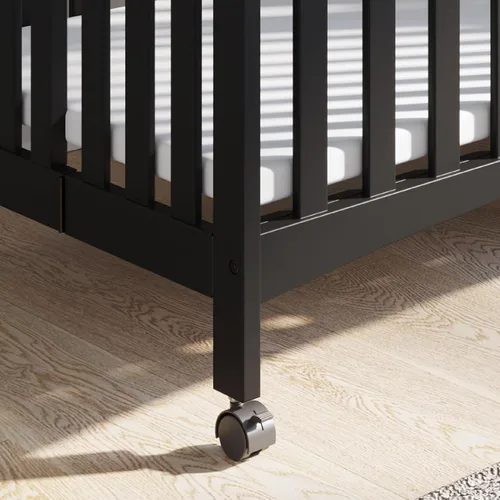 Vista 5 de Child Craft London - Mini cuna portátil plegable y compacta con colchón de cuna de 2 pulgadas y 2 ruedas de bloqueo fáciles de enrollar