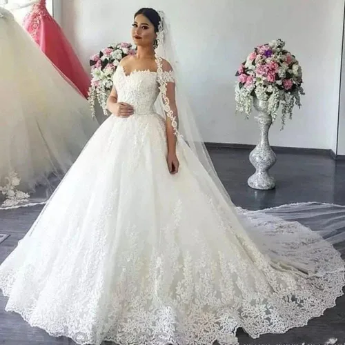 Vista 2 de XYAYE Verano playa una línea vestidos de novia para novia 2021 con mangas fuera del hombro vestido de novia con apliques XY013