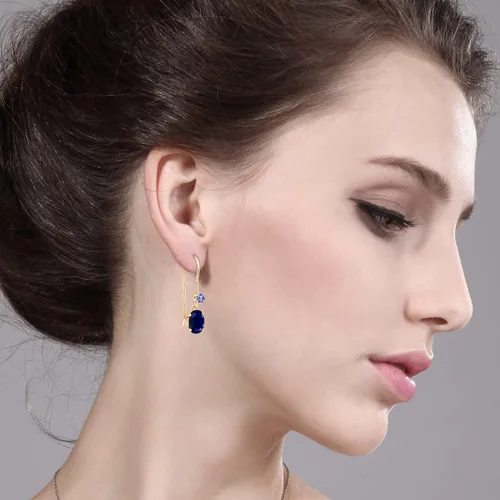 Vista 2 de Gem Stone King Aretes colgantes de oro amarillo de 14 quilates, zafiro azul y tanzanita azul, alambre francés para mujer