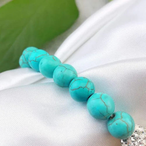 Vista 4 de Bocar Pulsera elástica de cuentas de cristal con cruz lateral chapada en metal