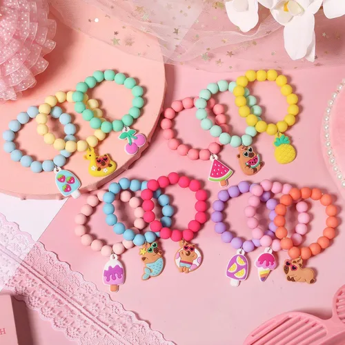 Vista 2 de PinkSheep Pulsera con colgante de cuentas de unicornio para niños y niñas, 6 unidades, arcoíris, monstruo, sol, flor, corazón, meteorito, amuleto
