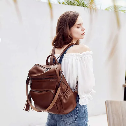Vista 7 de CLUCI - Morral para mujer, diseño de cuero, para viajes, bolso grande de hombro con borla