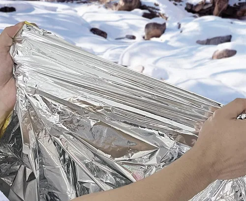 Vista 2 de Manta térmica de Mylar de emergencia para supervivencia, kits de primeros auxilios, ejército, al aire libre, senderismo, camping, trauma, desierto