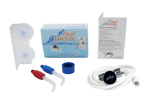 Vista 6 de Irrigador dental a chorro de agua ShowerBreeze, trata la enfermedad de las encías de manera natural, detiene el sangrado de encías
