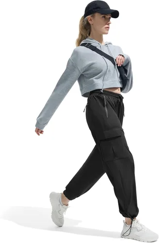 Vista 5 de FARUNGS Pantalones cargo de secado rápido, ligeros, tácticos, con 5 bolsillos, para mujer, cintura elástica y resistentes al agua