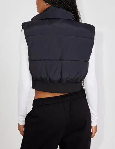 Vista 4 de Flygo Chaleco acolchado recortado con cremallera y cuello alto sin mangas acolchado para mujer