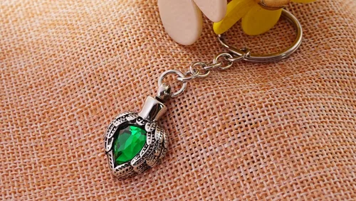 Vista 3 de Llavero de cremación de acero inoxidable con alas de ángel para cumpleaños, piedra de la suerte, cenizas colgantes, joyería conmemorativa