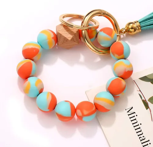 Vista 5 de Llavero de silicona, pulsera con cuentas, portátil, para llaves de la casa, del auto, con anillo