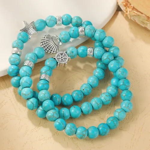 Vista 2 de 3 pulseras de turquesa con diseño de océano y cruz de conchas marinas, piedras de cristal curativas, pulseras de cuentas redondas elásticas