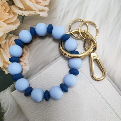 Vista 7 de Junyuerly Pulsera Llavero de Silicona con Cuentas para Mujeres, Brazalete Elástico con Anillo de Llaves Cuenta azul
