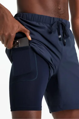 Vista 15 de Fabletics The One - Pantalón corto para hombre (forro), entrenamiento, natación, ligero, de secado rápido, bolsillo con cremallera, tejido elástico