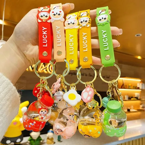 Vista 3 de BEXOA Lindo llavero líquido para regalo de Navidad Dijes de mochila Kawaii Shiba Inu llaveros flotantes para mujer