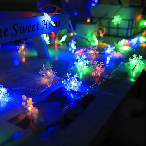 Vista 2 de Zimati Luces de Navidad multicolores, 20 pies, 40 luces LED multicolor de copo de nieve en cadena, 8 modos de temporizador, funciona