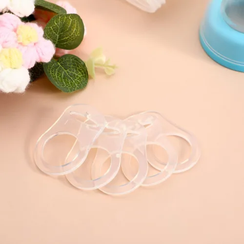 Vista 7 de 10 anillos adaptadores de silicona para bebés y clip compatibles con MAM (suave y transparente)