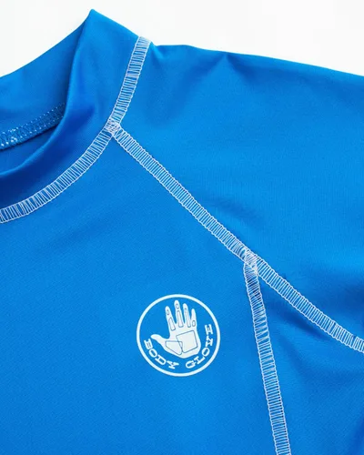 Vista 5 de Body Glove Camiseta de natación de manga corta con protección solar y arena para niños, paquete de 2 unidades UPF 50+ (2T-14)