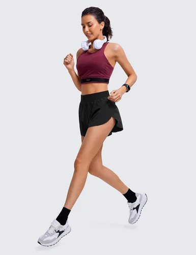 Vista 3 de CRZ YOGA Pantalones cortos de correr de delfín de cintura alta para mujer, de secado rápido, ligero, forro alto, pantalones cortos de entrenamiento