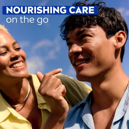 Vista 10 de NIVEA Crema hidratante para el cuerpo, la cara y las manos, fórmula alemana, rica crema hidratante corporal con provitamina B5, lata de 8.4 onzas