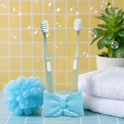 Vista 5 de Hodao Bowtie - Soporte para cepillos de dientes y bolígrafos para niños, bonito soporte de almacenamiento multifuncional de resina, organizador