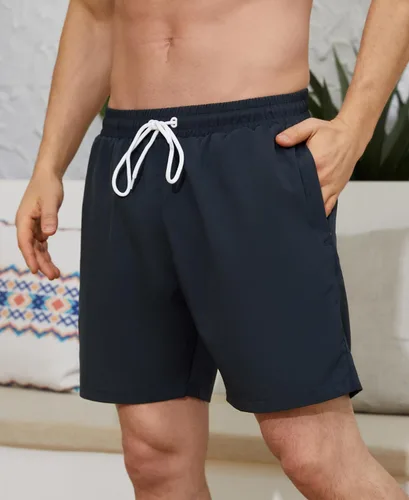 Vista 3 de Traje de baño para hombre con forro de compresión de 7 pulgadas, de secado rápido, con bolsillos con cremallera