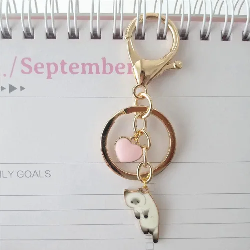 Vista 3 de Lindo llavero de gatito blanco con corazón de amor para mujer, joyería creativa para amantes de los gatos