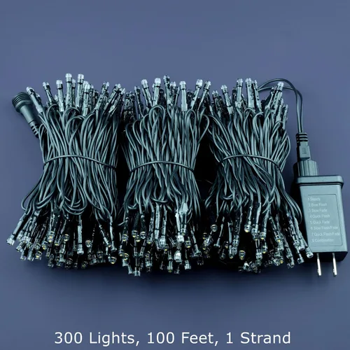 Vista 5 de Cadena de 300 luces LED de Navidad de color blanco cálido, 30.5 metros de luces LED de gran angular de 5mm con adaptador de 8 modelos (cable negro)