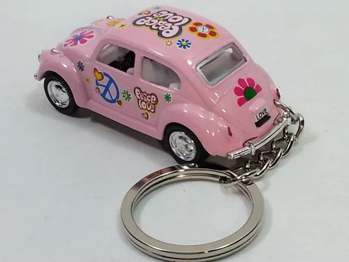 Vista 2 de KiNSMART. Llavero clásico rosa de amor y paz Volkswagen hippie escarabajo 164, coche de metal fundido a presión de color pastel, PEQUEÑO