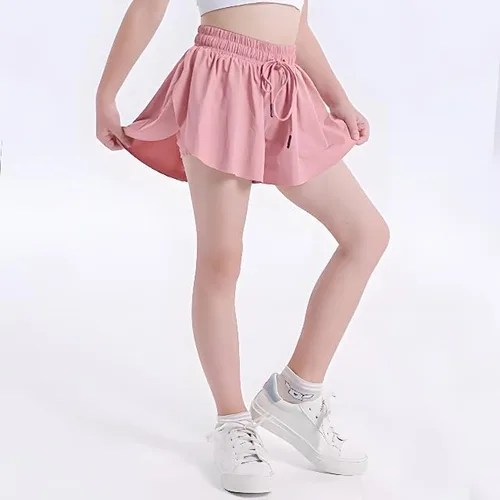 Vista 2 de ASHER FASHION Pantalones cortos fluidos para niñas, pantalones cortos deportivos 2 en 1 con bolsillo, pantalones cortos para correr para niñas