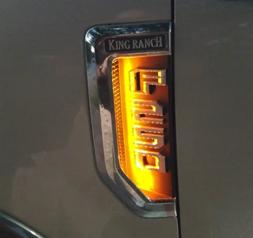 Vista 6 de iJDMTOY Kit de iluminación de fondo LED amarillo ámbar compatible con Ford F250 F350 F450 Super Duty 2017-2021 emblema cromado de guardabarros