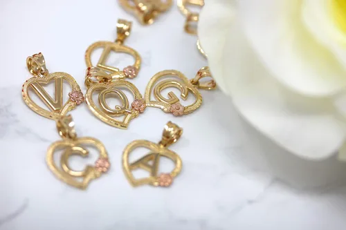 Vista 4 de Colgante de corazón de dos tonos de 14 quilates en oro amarillo y rosa